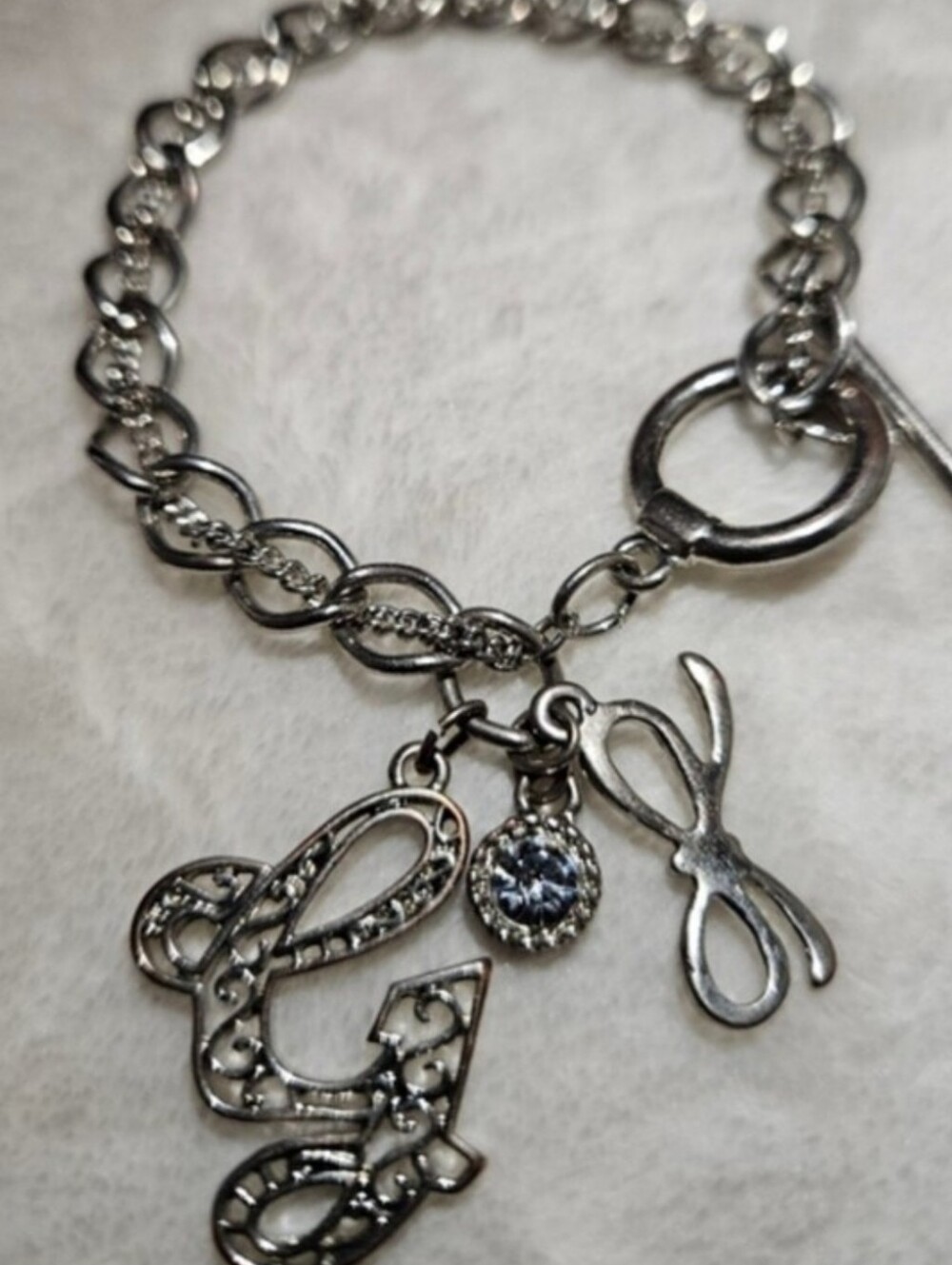 G by Guess Silver-Tone Charm Bracelet with 'G' Initial Bow and Crystal Accent